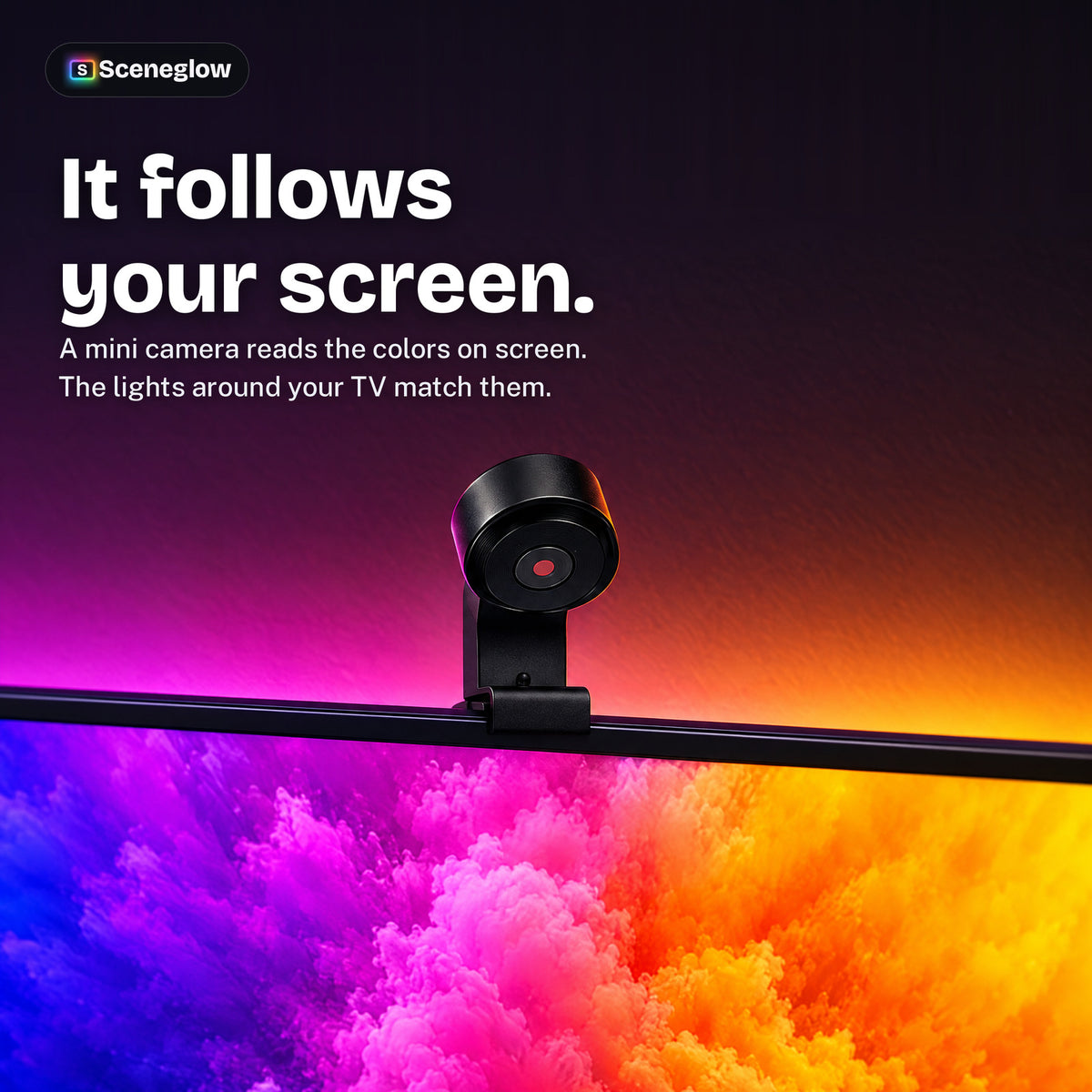 The Sceneglow mini camera clipped to the top of a TV, reading the colors on screen